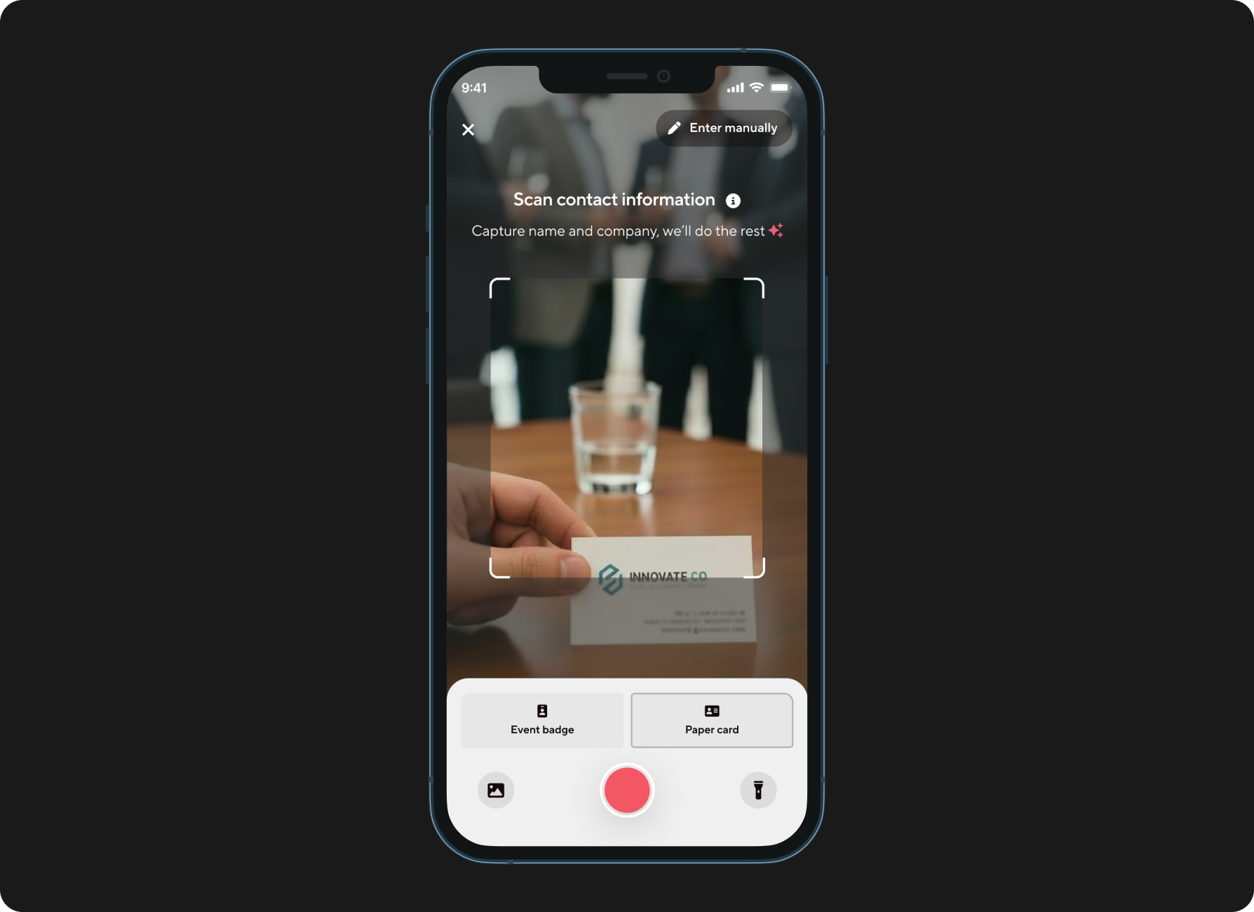 Dark UI camera view - paper card scanner in use at a networking event