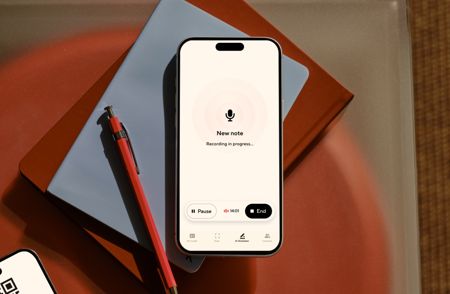 AI Notetaker — phone showing a recording in progress